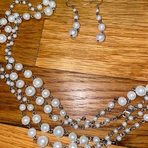 Long pearl necklace with earrings
